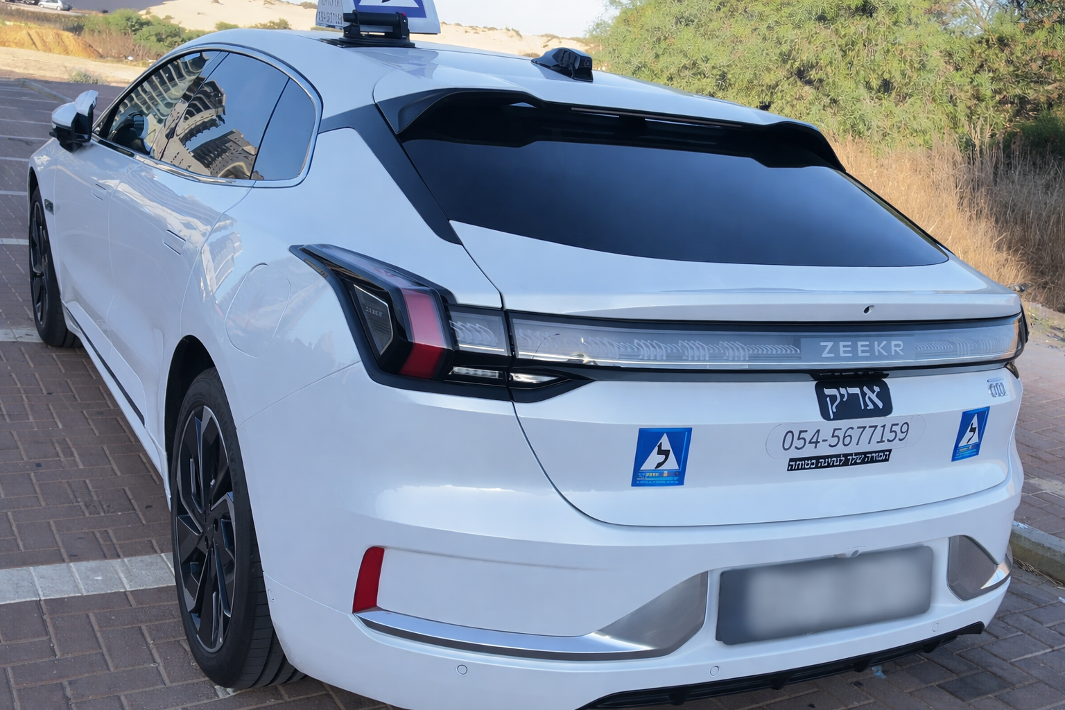 Instructor and student in car